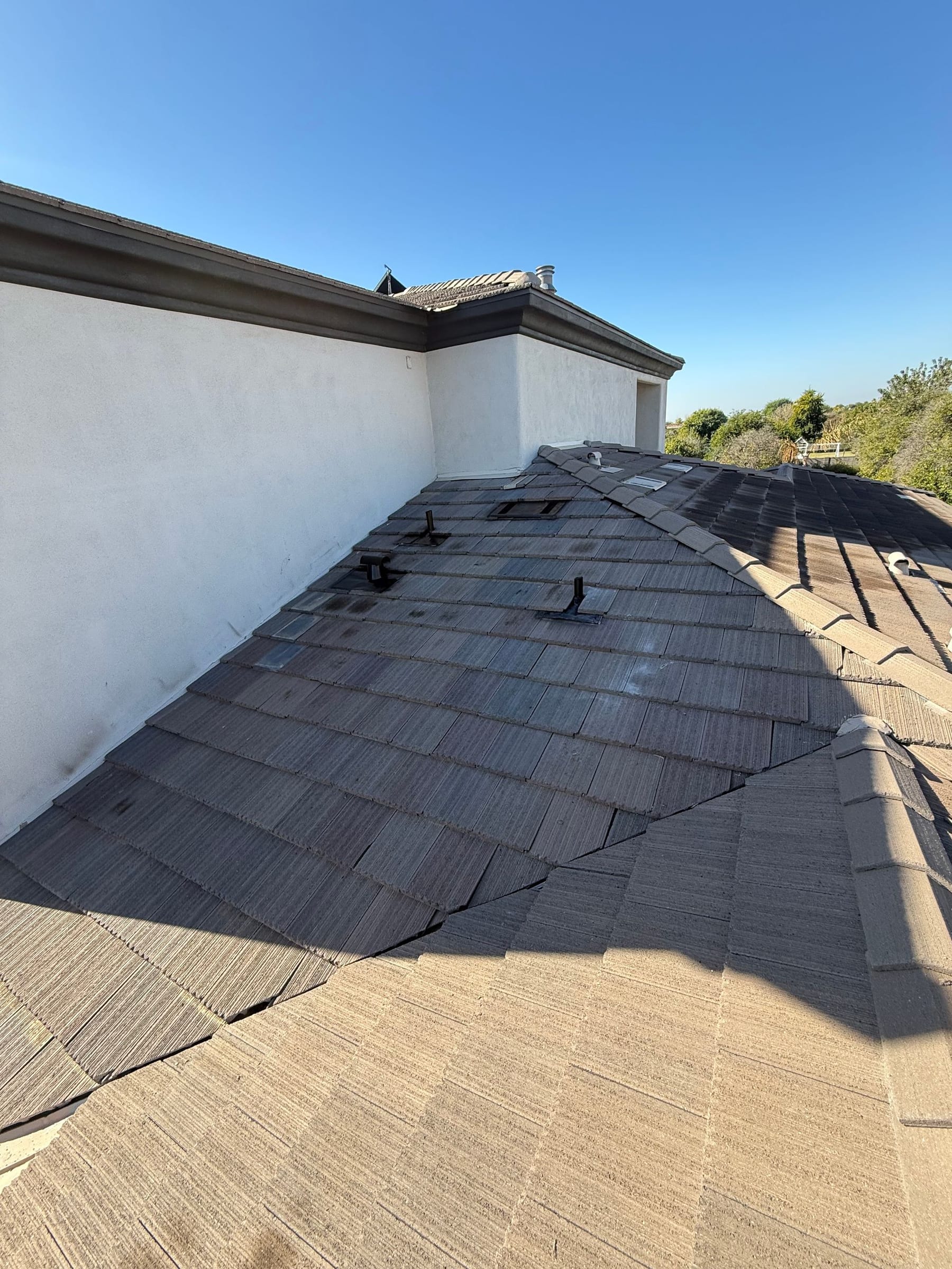 Roof inspection underway on a home in Phoenix, AZ